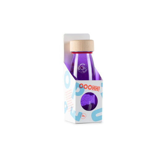 Botella sensorial morada en su envase