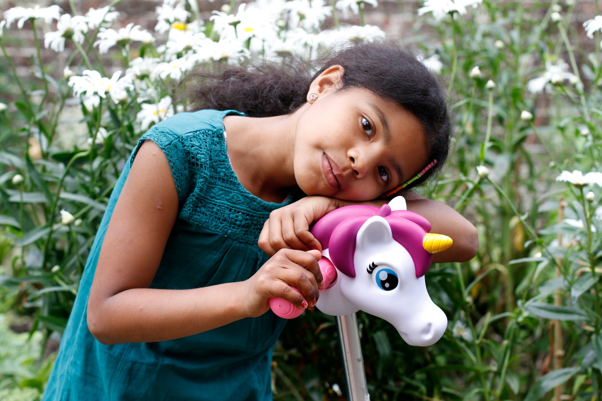 Cabeza de unicornio para patinete infantil